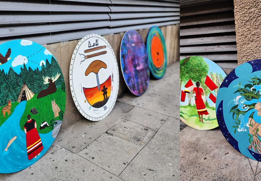 murals painted on circular wooden pieces 