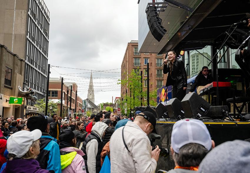 The Argyle Street Shore Party rocked Argyle Street Friday, Saturday and Sunday night. Here, crowds brave the weather to watch an artist perform. 