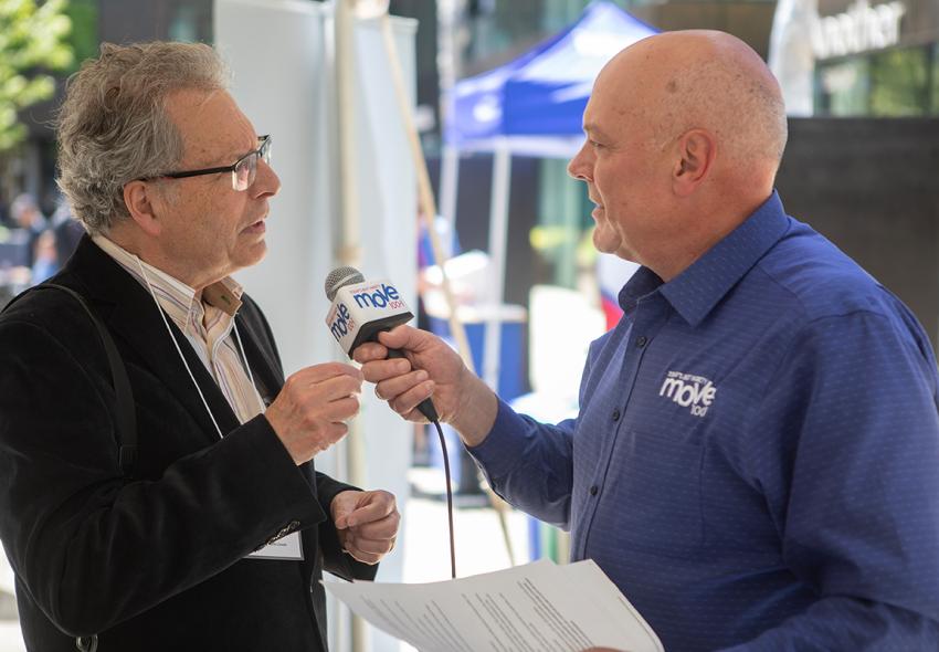 Ken Kelly from IDA Canada gets interviewed by Peter Harrison from MOVE 100 at the Downtown Halifax Vision 2030 launch event on June 5. 