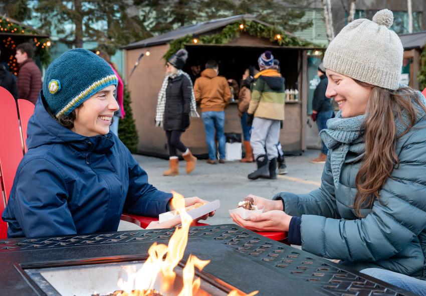 Take a break at one of the cozy fire pits at the Evergreen Market. 