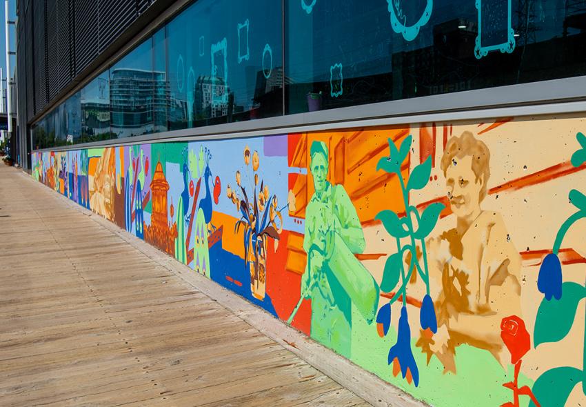 108' wide long mural at the Halifax Seaport by @swadeowens and @ vbrumwellart