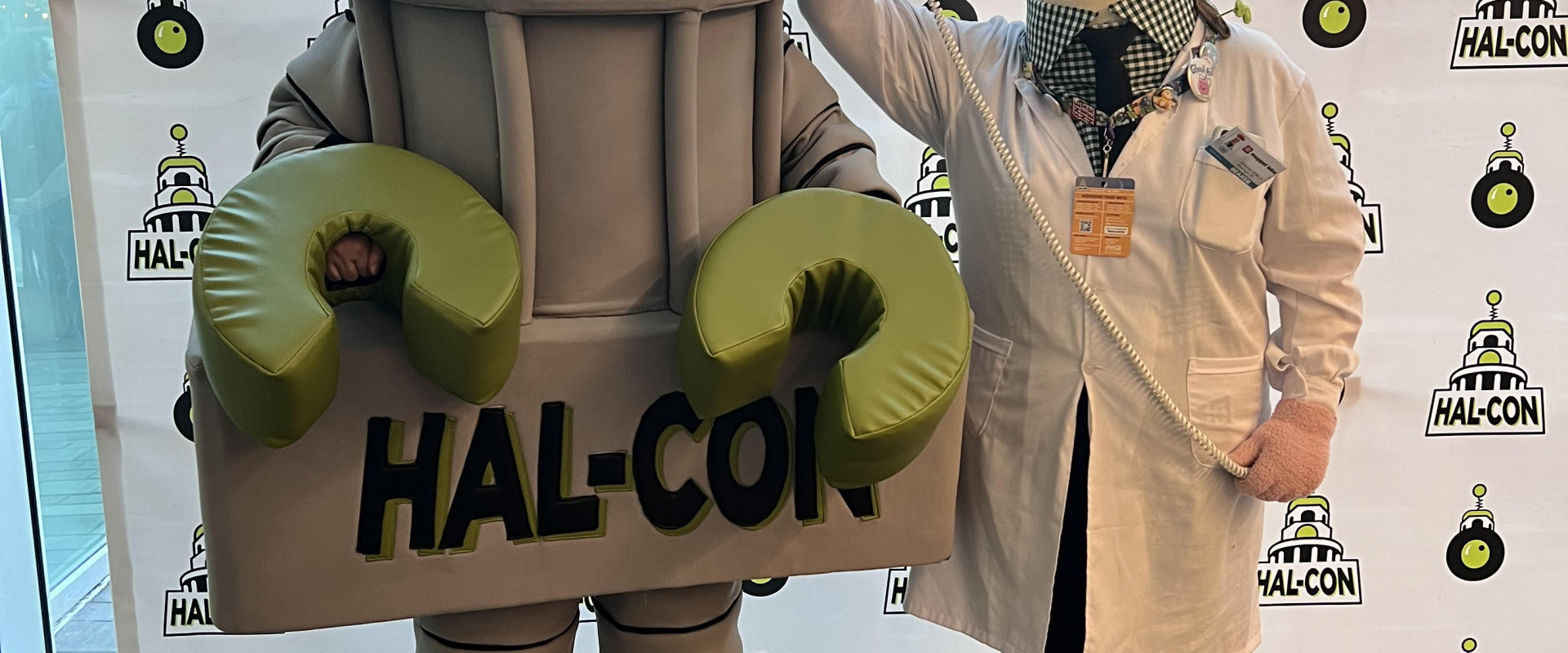 Hal-Con mascot Nelson poses with attendee dressed as Muppet Beaker