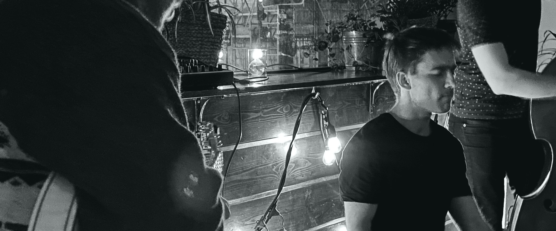 Black and white image of musicians playing at Obladee.