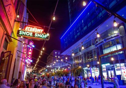 Economy Shoe Shop outdoor patio at night