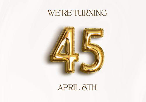 Golden balloons in the shape of the number 45 - We're turning 45 April 8th