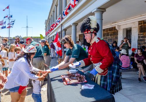 Canada Day cake being served to visitors.