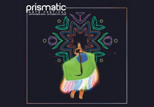 The Prismatic 2025 festival graphic, featuring the festival dates of "September 26th - October 5th, 2025" and the "Prismatic Arts Festival" logo in white, simple text. The image centres a stylized figure seen from behind, dressed in vibrant regalia with a bright green shawl, multicolored fringe skirt, moccasins, and a feather headpiece. The figure has a long braid and appears to be mid-dance. Above them is a glowing, symmetrical design resembling floral and abstract motifs in neon colors.