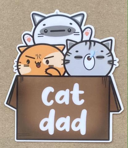 Sticker with three cats in a box. Box says "Cat Dad." 
